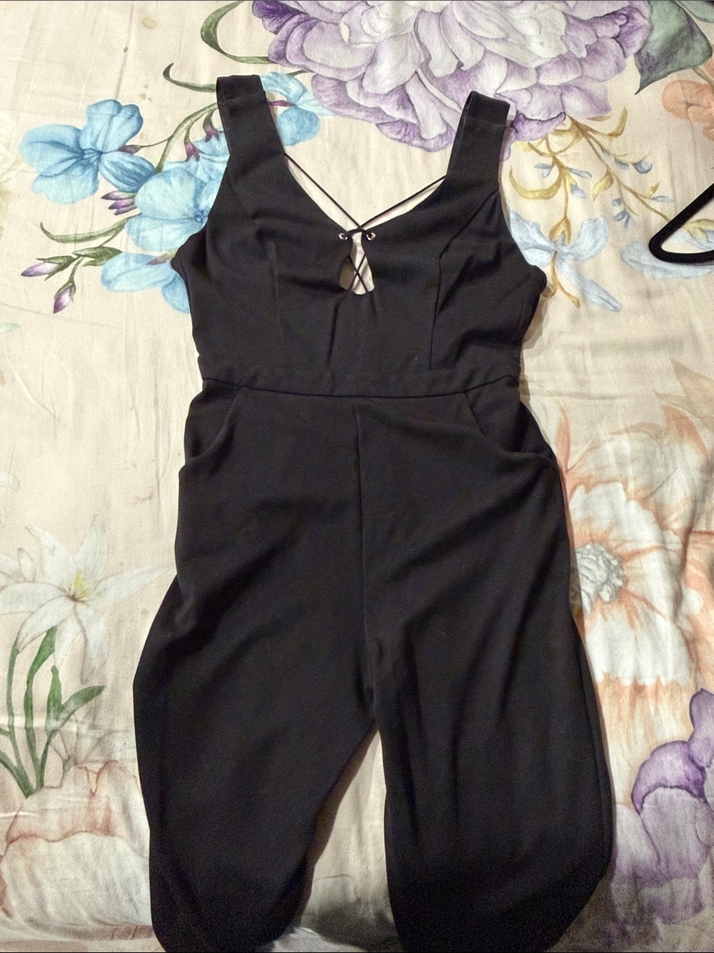 bebe Black Sleeveless Jumpsuit with Cross-Strap Detail